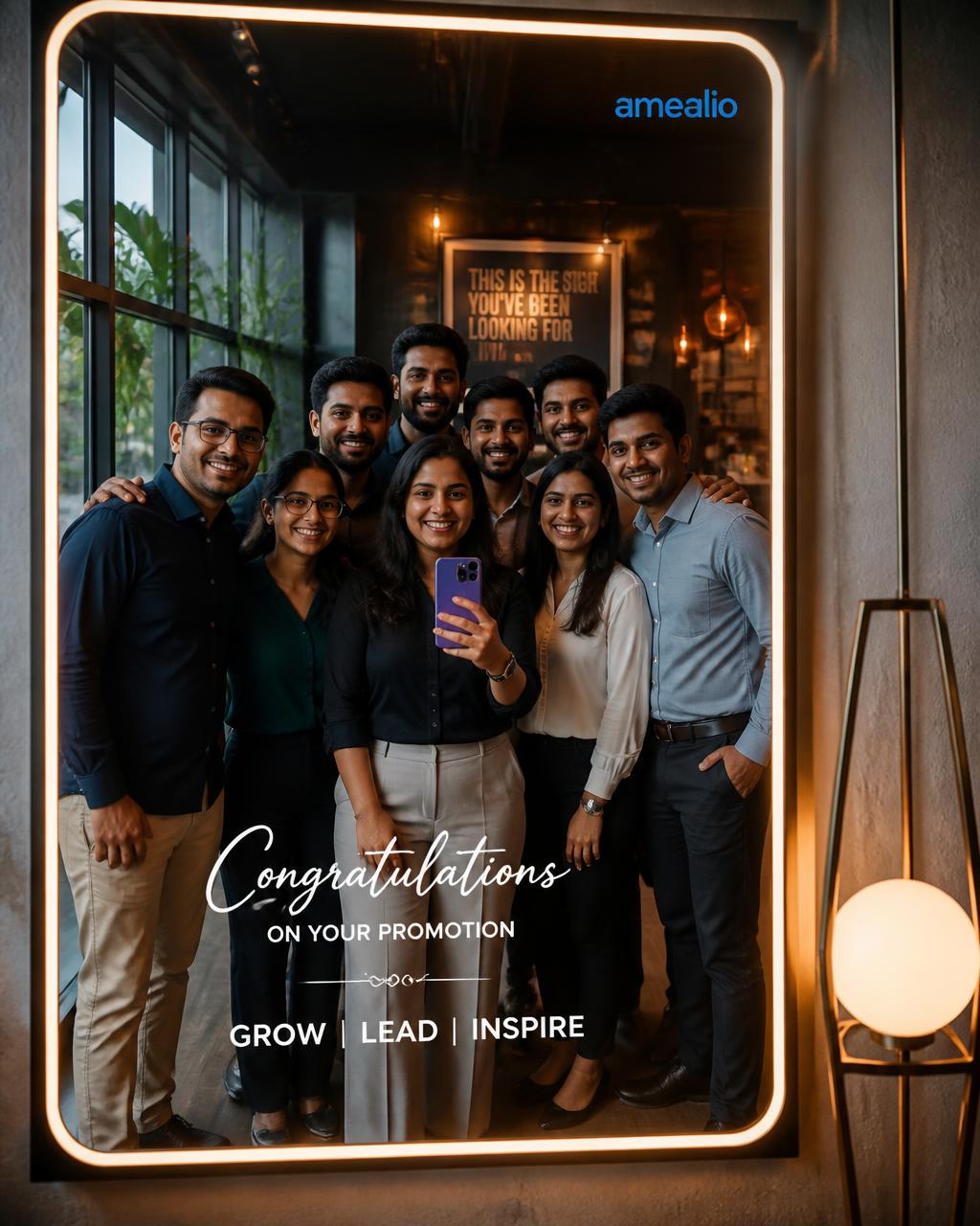 Office team promotion selfie at a mirror